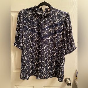 Loft short sleeve navy and white floral print blouse.